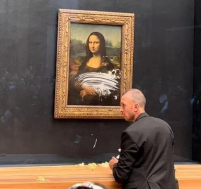 Mona Lisa's protective glass is covered with cream